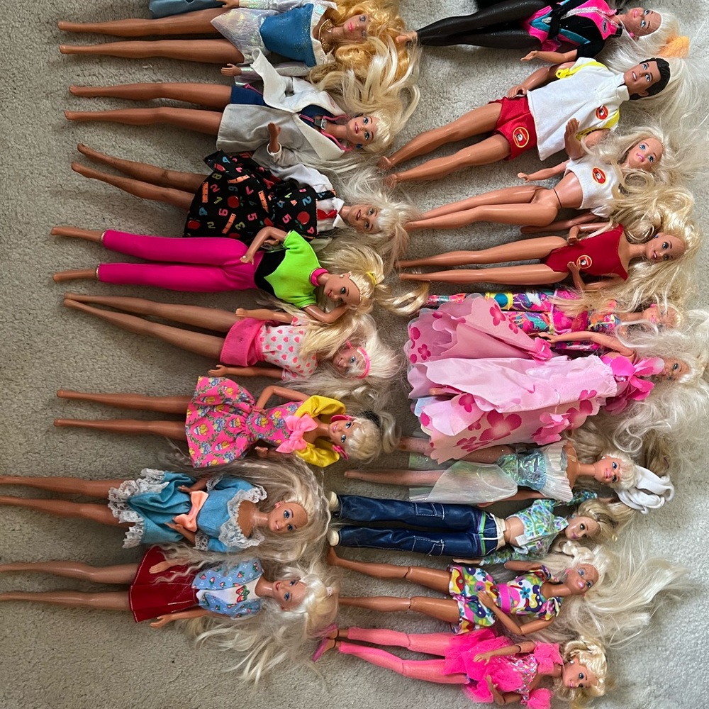 Barbie Dolls 19 plus a Pocohontas doll